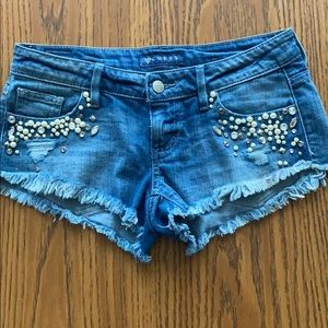 Guess embellished shorts size 24, runs big